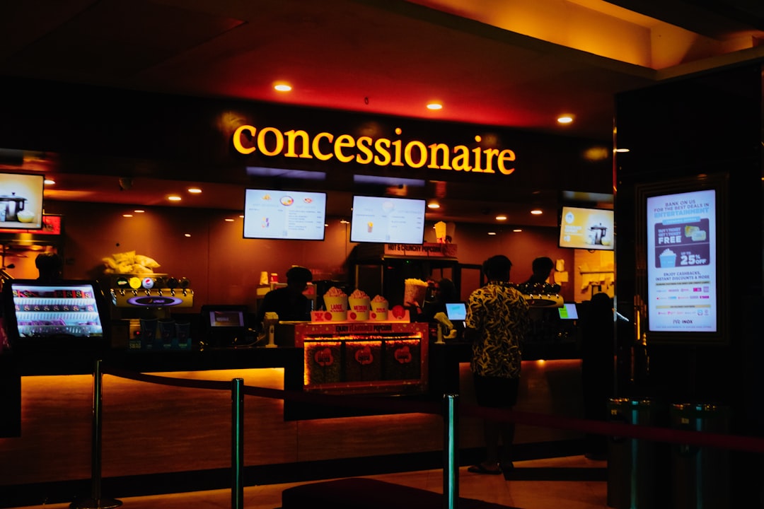 Cinema concession stand with glowing sign