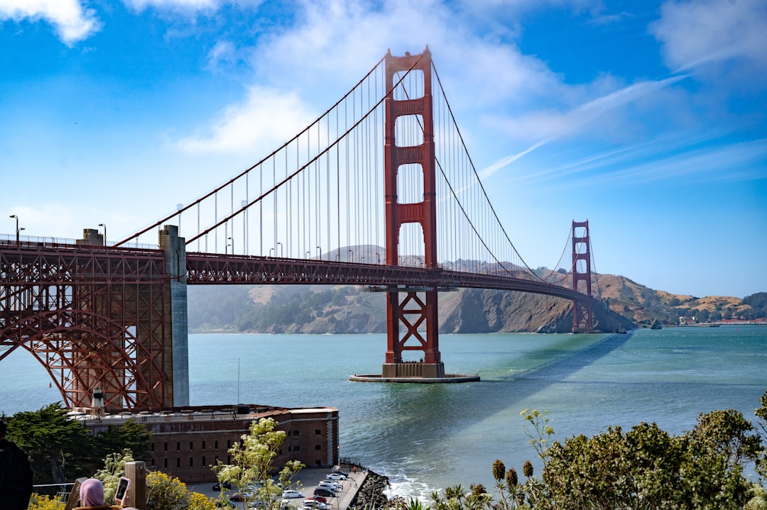 The golden gate bridge sits over the water