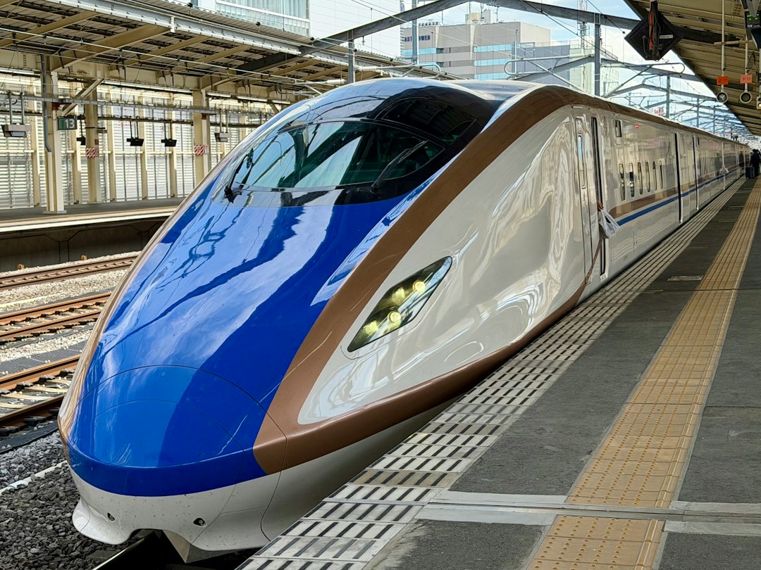A modern bullet train at a station platform