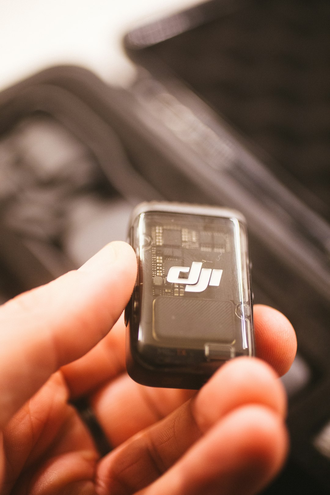A person holding a cell phone in their hand