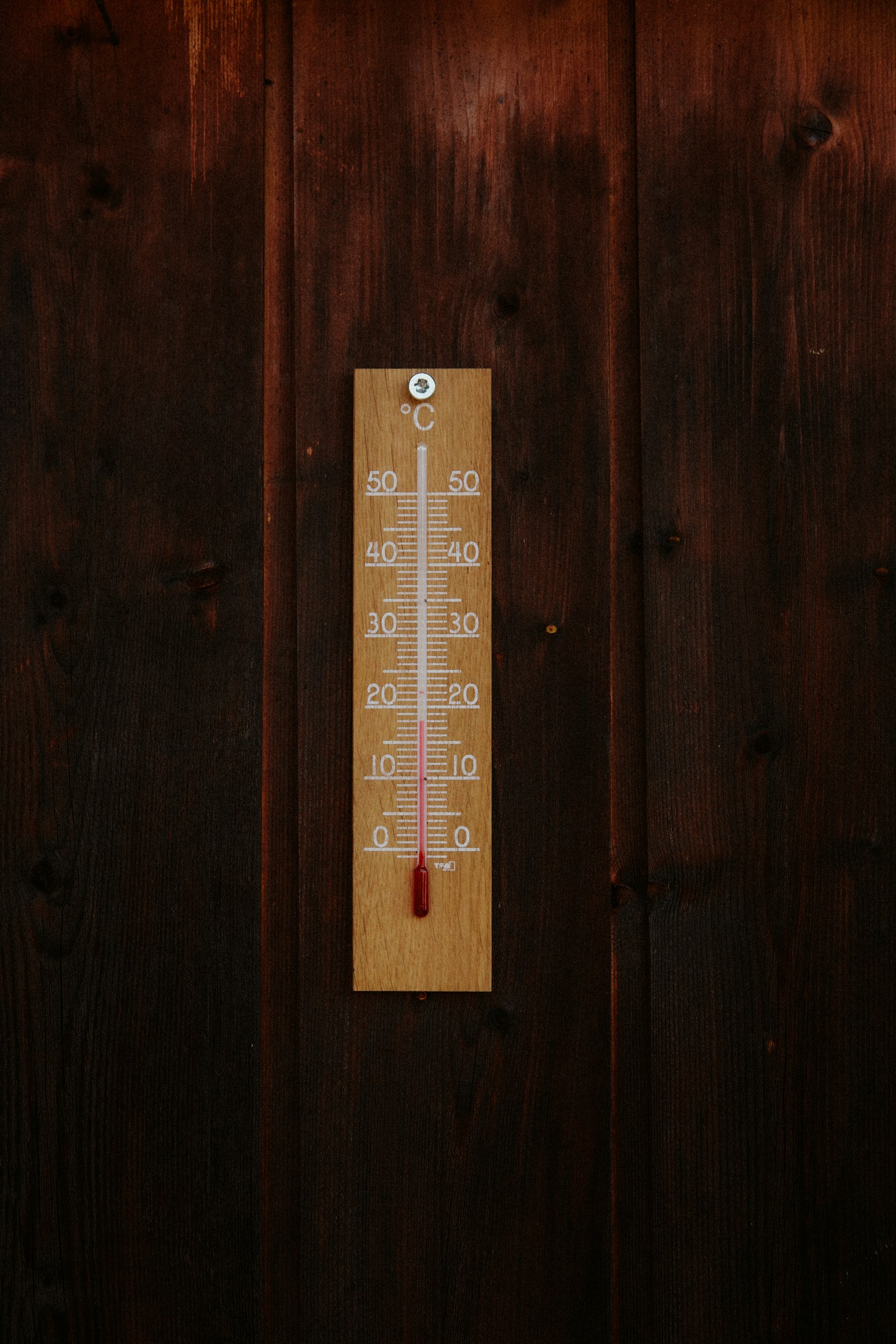 brown wooden wall mounted device